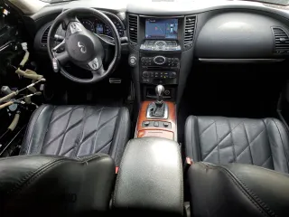 2014 Infiniti QX70 с VIN JN8CS1MW9EM411428, выставлен на аукционе Copart как лот 48016895 с пробегом 110 302 миль миль и Списание • Salvage title. История ставок и продаж доступна на DreamBid. Изображение 8.