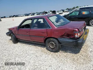 1991 Toyota Camry DLX z VIN 4T1SV21E4MU332100, wystawiony jako Copart lot #64645474 z przebiegiem 164 143 mil mil oraz Czysty tytuł • Clean title. Historia ofert i sprzedaży dostępna na DreamBid. Obrazek 2.