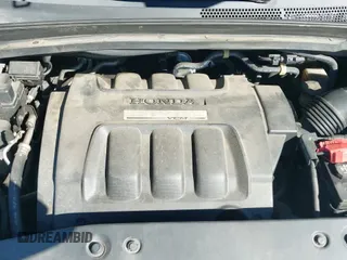 2007 Honda Odyssey EX-L z VIN 5FNRL38607B428946, wystawiony jako IAAI lot #43408399 z przebiegiem 188 636 mil mil oraz . Historia ofert i sprzedaży dostępna na DreamBid. Obrazek 19.