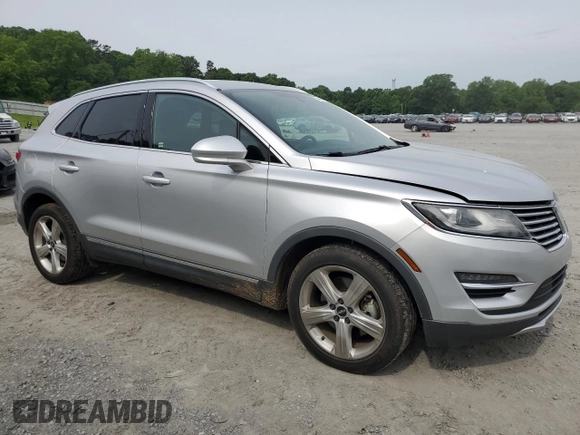 2017 Lincoln MKC Premiere with VIN 5LMCJ1C91HUL32617, listed as a Copart auction lot 57444215 with 106,285 mi miles and Salvage title. Bid and sale history available at DreamBid. Image 4.