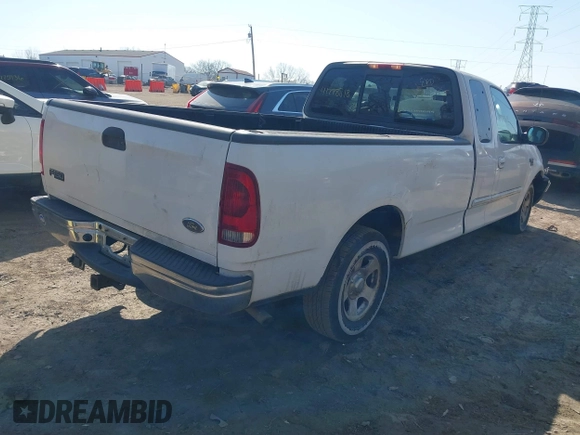 2003 Ford F-150 with VIN 2FTRX17L63CA31923, listed as a IAAI auction lot 41778818 with 107,600 mi miles and . Bid and sale history available at DreamBid. Image 4.