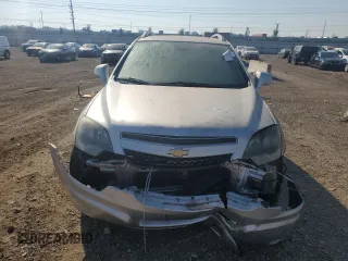 2015 Chevrolet Captiva Sport LT with VIN 3GNAL3EK7FS511382, listed as a Copart auction lot 68749624 with 143,922 mi miles and Salvage Title. Bid and sale history available at DreamBid. Image 5.