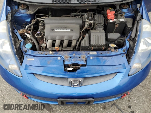 2007 Honda Fit with VIN JHMGD38497S020207, listed as a Copart auction lot 57447875 with 185,603 mi miles and Salvage title. Bid and sale history available at DreamBid. Image 11.