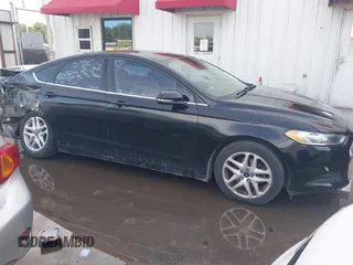 2015 Ford Fusion SE z VIN 1FA6P0H71F5123623, wystawiony jako IAAI lot #42314030 z przebiegiem 129 977 mil mil oraz . Historia ofert i sprzedaży dostępna na DreamBid. Obrazek 14.
