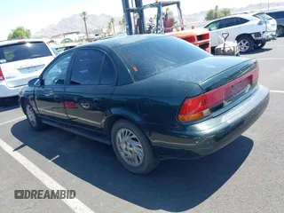 1999 Saturn SL с VIN 1G8ZK5274XZ304652, выставлен на аукционе IAAI как лот 42618620 с пробегом 98 131 миль миль и . История ставок и продаж доступна на DreamBid. Изображение 3.