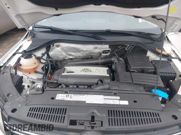 2012 Volkswagen Tiguan S with VIN WVGBV7AX0CW543697, listed as a IAAI auction lot 41853077 with 113,002 mi miles and . Bid and sale history available at DreamBid. Image 10.