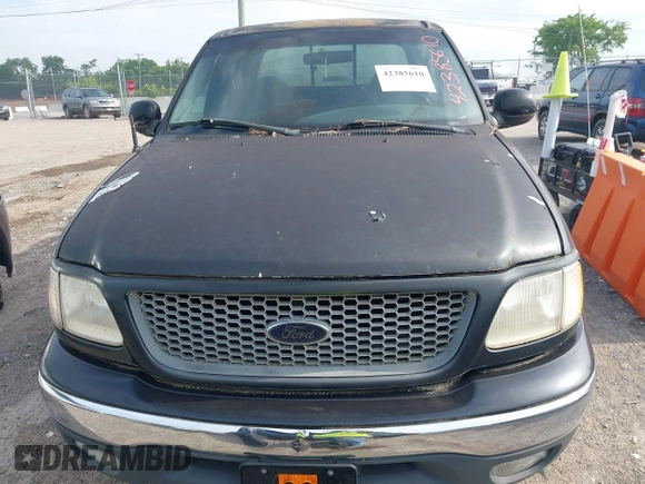 2001 Ford F-150 XLT with VIN 1FTRW08L61KD90032, listed as a IAAI auction lot 42385610 with 164,252 mi miles and . Bid and sale history available at DreamBid. Image 6.