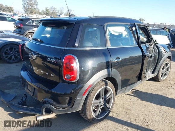 2013 MINI Countryman S z VIN WMWZC3C57DWP22928, wystawiony jako IAAI lot #41665753 z przebiegiem Nie podano mil oraz . Historia ofert i sprzedaży dostępna na DreamBid. Obrazek 4.