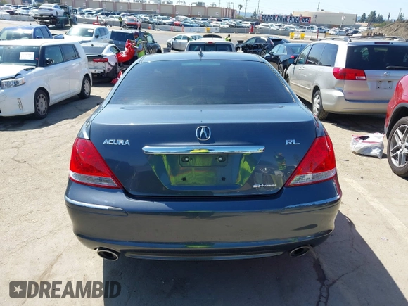 2006 Acura RL z VIN JH4KB16516C004396, wystawiony jako IAAI lot #41959850 z przebiegiem 114 670 mil mil oraz . Historia ofert i sprzedaży dostępna na DreamBid. Obrazek 15.