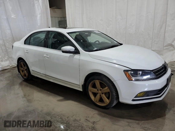 2017 Volkswagen Jetta SEL with VIN 3VWL17AJ3HM410145, listed as a Copart auction lot 58792565 with 186,732 mi miles and Salvage title. Bid and sale history available at DreamBid. Image 4.
