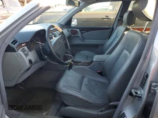 1999 Mercedes-Benz E-Class with VIN WDBJF65H8XA734585, listed as a Copart auction lot 79141194 with 196,908 mi miles and Salvage Title. Bid and sale history available at carsss.com. Image 7.