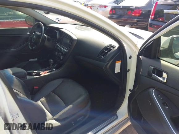 2015 Kia Optima EX with VIN KNAGN4AD6F5091809, listed as a IAAI auction lot 42257458 with 104,819 mi miles and . Bid and sale history available at DreamBid. Image 5.