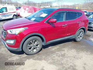 2014 Hyundai Santa Fe z VIN 5XYZUDLB3EG226857, wystawiony jako IAAI lot #41917762 z przebiegiem 42 677 mil mil oraz . Historia ofert i sprzedaży dostępna na DreamBid. Obrazek 2.