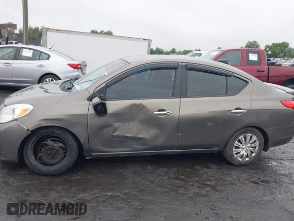 2013 Nissan Versa S with VIN 3N1CN7AP9DL861143, listed as a IAAI auction lot 42538137 with 249,439 mi miles and . Bid and sale history available at DreamBid. Image 6.