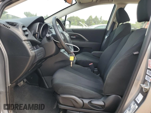 2015 Mazda 5 Sport with VIN JM1CW2BL4F0181336, listed as a Copart auction lot 60156025 with 72,079 mi miles and Salvage title. Bid and sale history available at DreamBid. Image 7.