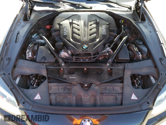 2015 BMW 6 Series 650i xDrive with VIN WBA6B4C55FD761124, listed as a Copart auction lot 50559555 with 49,735 mi miles and Salvage Title. Bid and sale history available at DreamBid. Image 11.