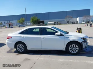 2015 Toyota Camry Hybrid LE with VIN 4T1BD1FK9FU155428, listed as a IAAI auction lot 41666063 with 154,608 mi miles. Bid and sale history available at carsss.com. Image 14.