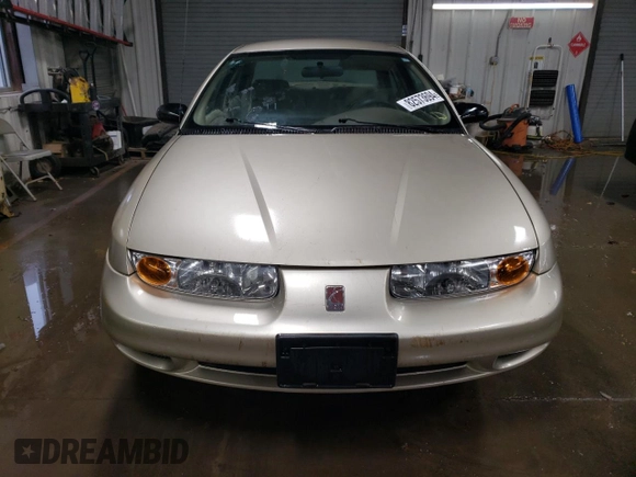 2000 Saturn SL with VIN 1G8ZK5278YZ269342, listed as a Copart auction lot 82573694 with 53,641 mi miles and Salvage title. Bid and sale history available at DreamBid. Image 5.