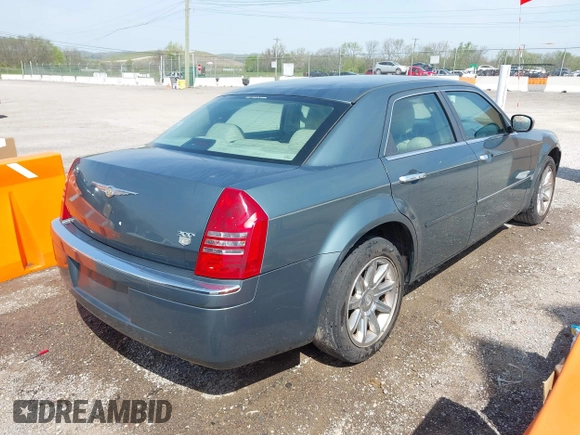 2006 Chrysler 300 C with VIN 2C3KA63H76H141246, listed as a IAAI auction lot 42035339 with 208,798 mi miles. Bid and sale history available at carsss.com. Image 4.