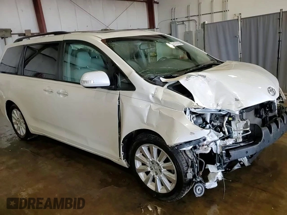2015 Toyota Sienna XLE with VIN 5TDYK3DC4FS688299, listed as a Copart auction lot 61793155 with 57,197 mi miles and Salvage title. Bid and sale history available at DreamBid. Image 15.