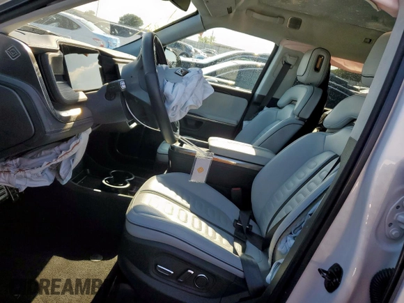 2023 Rivian R1S Launch Edition z VIN 7PDSGABL9PN010792, wystawiony jako Copart lot #56359465 z przebiegiem 24 319 mil mil oraz Szkoda całkowita • Salvage title. Historia ofert i sprzedaży dostępna na DreamBid. Obrazek 7.