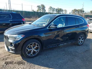 2018 BMW X1 xDrive28i with VIN WBXHT3C36J5L29746, listed as a IAAI auction lot 41547100 with 103,420 mi miles and . Bid and sale history available at DreamBid. Image 2.