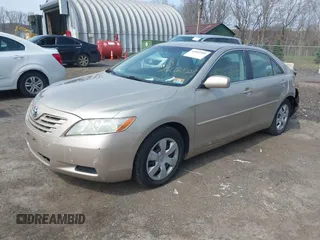 2007 Toyota Camry CE with VIN 4T1BE46K97U714878, listed as a IAAI auction lot 42002509 with 118,118 mi miles and . Bid and sale history available at DreamBid. Image 19.