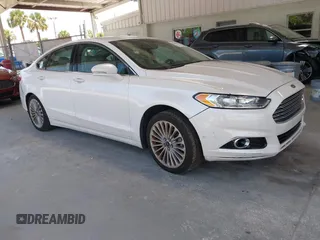 2016 Ford Fusion Titanium with VIN 3FA6P0K96GR390989, listed as a IAAI auction lot 42634275 with 123,559 mi miles and . Bid and sale history available at DreamBid. Image 1.