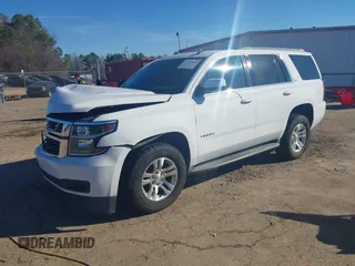 2015 Chevrolet Tahoe LT with VIN 1GNSCBKC0FR104096, listed as a IAAI auction lot 41679298 with 231,005 mi miles and . Bid and sale history available at DreamBid. Image 20.
