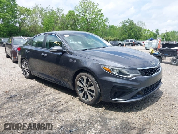 2019 Kia Optima LX z VIN 5XXGT4L32KG298796, wystawiony jako IAAI lot #42266827 z przebiegiem 89 841 mil mil oraz . Historia ofert i sprzedaży dostępna na DreamBid. Obrazek 1.