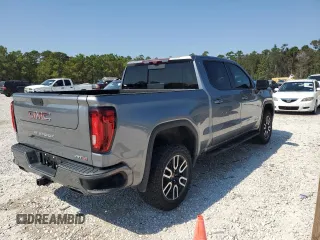 2021 GMC Sierra 1500 AT4 with VIN 1GTP9EEL8MZ156714, listed as a Copart auction lot 75759564 with 42,648 mi miles and Salvage Title. Bid and sale history available at carsss.com. Image 3.