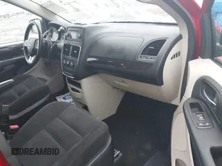 2014 Dodge Grand Caravan American Value with VIN 2C4RDGBG0ER452719, listed as a IAAI auction lot 41547145 with 151,636 mi miles and . Bid and sale history available at DreamBid. Image 5.