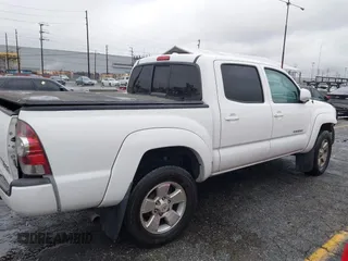 2009 Toyota Tacoma PreRunner with VIN 3TMJU62NX9M078106, listed as a IAAI auction lot 41768489 with 83,360 mi miles. Bid and sale history available at carsss.com. Image 13.