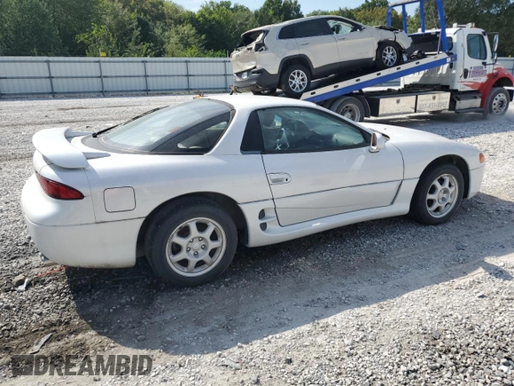 1996 Mitsubishi 3000GT GT z VIN JA3AM84J7TY005775, wystawiony jako Copart lot #70461554 z przebiegiem 102 704 mil mil oraz Tytuł czysty. Historia ofert i sprzedaży dostępna na DreamBid. Obrazek 3.