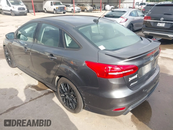 2016 Ford Focus SE z VIN 1FADP3F28GL360512, wystawiony jako IAAI lot #42427723 z przebiegiem 217 172 mil mil oraz . Historia ofert i sprzedaży dostępna na DreamBid. Obrazek 3.