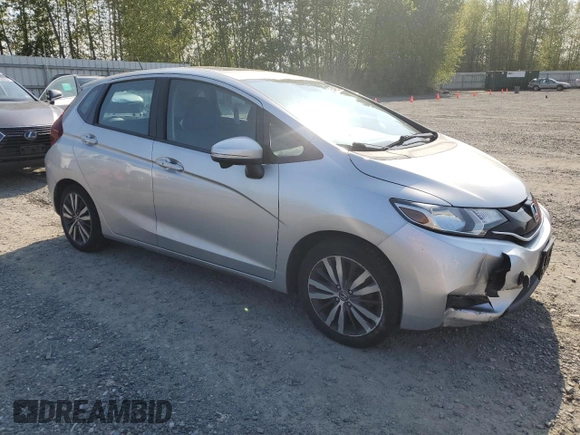 2015 Honda Fit EX-L with VIN 3HGGK5H82FM704093, listed as a Copart auction lot 54449815 with 120,570 mi miles and Salvage Title. Bid and sale history available at carsss.com. Image 4.