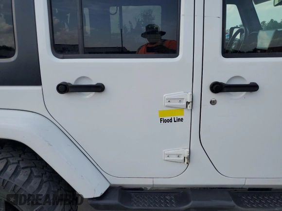 2013 Jeep Wrangler Unlimited Sahara with VIN 1C4BJWEG4DL536694, listed as a Copart auction lot 57714035 with 146,257 mi miles and Salvage title. Bid and sale history available at DreamBid. Image 13.