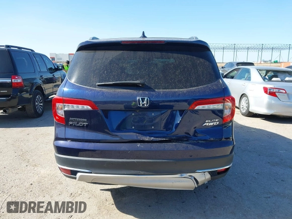 2020 Honda Pilot Elite with VIN 5FNYF6H02LB054348, listed as a IAAI auction lot 42302525 with 43,916 mi miles and . Bid and sale history available at DreamBid. Image 16.