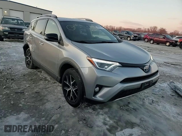 2018 Toyota RAV4 Hybrid SE z VIN JTMJJREV0JD246230, wystawiony jako Copart lot #89095135 z przebiegiem Nie podano mil oraz Szkoda całkowita • Salvage title. Historia ofert i sprzedaży dostępna na DreamBid. Obrazek 12.