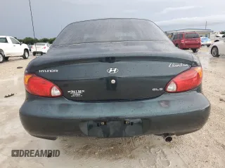 2000 Hyundai Elantra GLS z VIN KMHJF35F3YU002102, wystawiony jako Copart lot #73243004 z przebiegiem 79 155 mil mil oraz Szkoda całkowita • Salvage title. Historia ofert i sprzedaży dostępna na DreamBid. Obrazek 6.