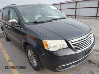 2014 Chrysler Town & Country Touring L 30th Anniversary z VIN 2C4RC1CG4ER133192, wystawiony jako IAAI lot #41113205 z przebiegiem 191 964 mil mil oraz . Historia ofert i sprzedaży dostępna na DreamBid. Obrazek 1.