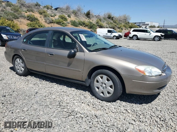 2003 Ford Taurus LX Standard z VIN 1FAFP52U63G277370, wystawiony jako Copart lot #56184345 z przebiegiem 115 778 mil mil oraz Szkoda całkowita • Salvage title. Historia ofert i sprzedaży dostępna na DreamBid. Obrazek 4.