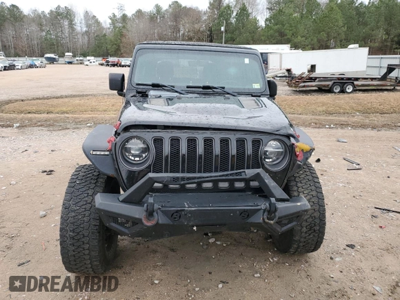 2021 Jeep Wrangler Unlimited Rubicon with VIN 1C4JJXFM0MW627692, listed as a Copart auction lot 43525105 with 102,472 mi miles and Salvage Title. Bid and sale history available at carsss.com. Image 5.