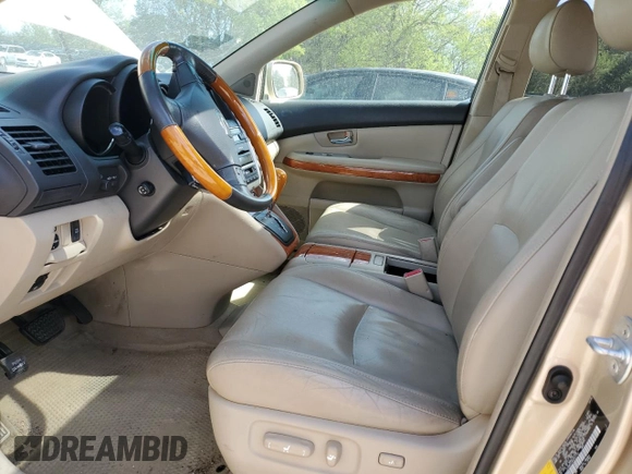 2008 Lexus RX 400h with VIN JTJGW31UX82007745, listed as a Copart auction lot 52857445 with 159,062 mi miles and Salvage Title. Bid and sale history available at DreamBid. Image 7.