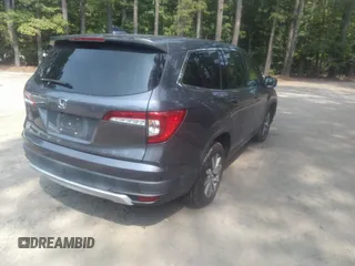 2020 Honda Pilot EX-L with VIN 5FNYF5H57LB003241, listed as a IAAI auction lot 39974466 with 51,455 mi miles. Bid and sale history available at carsss.com. Image 4.