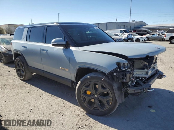 2023 Rivian R1S Adventure z VIN 7PDSGABA1PN021963, wystawiony jako Copart lot #43451105 z przebiegiem 165 mil mil oraz Szkody całkowita. Historia ofert i sprzedaży dostępna na DreamBid. Obrazek 4.