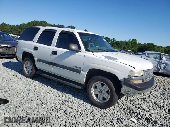 2000 Chevrolet Tahoe LS with VIN 1GNEK13T2YJ203352, listed as a Copart auction lot 58077765 with 314,293 mi miles and Salvage title. Bid and sale history available at DreamBid. Image 4.