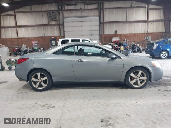 2007 Pontiac G6 GT z VIN 1G2ZH361X74127590, wystawiony jako IAAI lot #41828684 z przebiegiem 120 819 mil mil oraz . Historia ofert i sprzedaży dostępna na DreamBid. Obrazek 13.