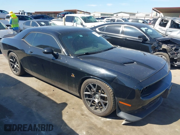 2016 Dodge Challenger R/T Scat Pack z VIN 2C3CDZFJ7GH217691, wystawiony jako IAAI lot #42228253 z przebiegiem 120 226 mil mil oraz . Historia ofert i sprzedaży dostępna na DreamBid. Obrazek 1.