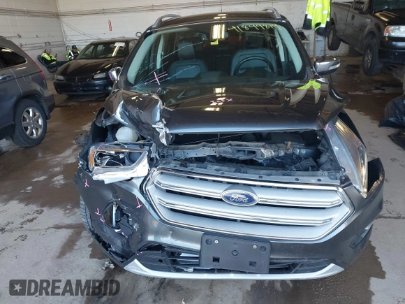 2019 Ford Escape Titanium with VIN 1FMCU9J95KUA19816, listed as a IAAI auction lot 41899819 with 71,760 mi miles and . Bid and sale history available at DreamBid. Image 6.
